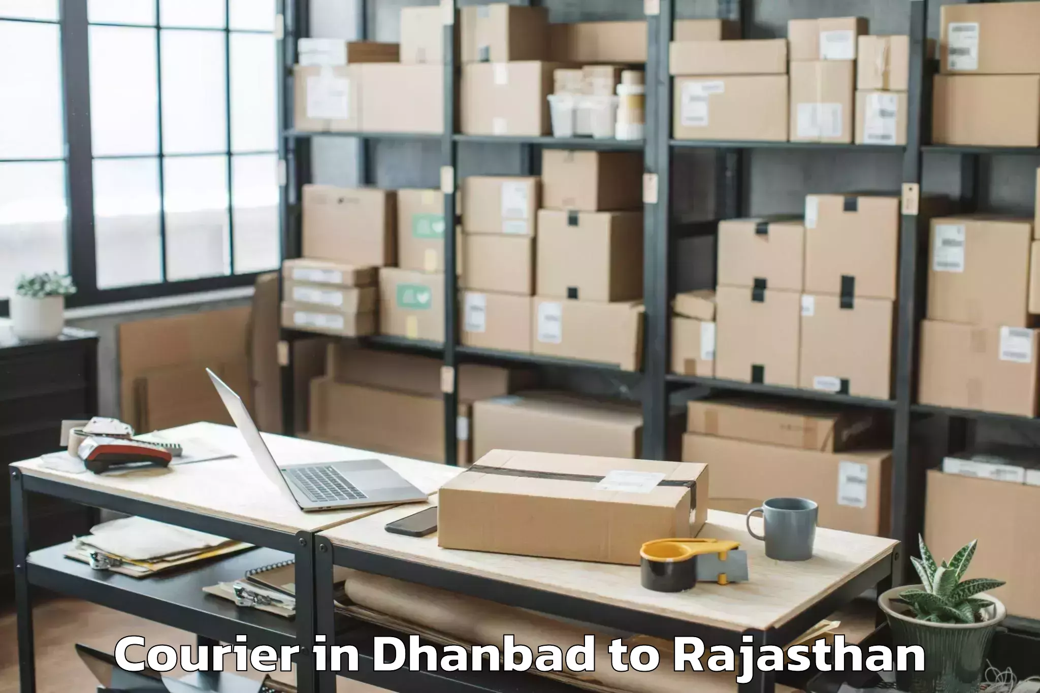 Easy Dhanbad to Chhabra Courier Booking